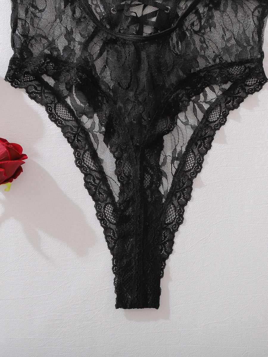 Sexy patent leather and lace bodysuit with a choker.