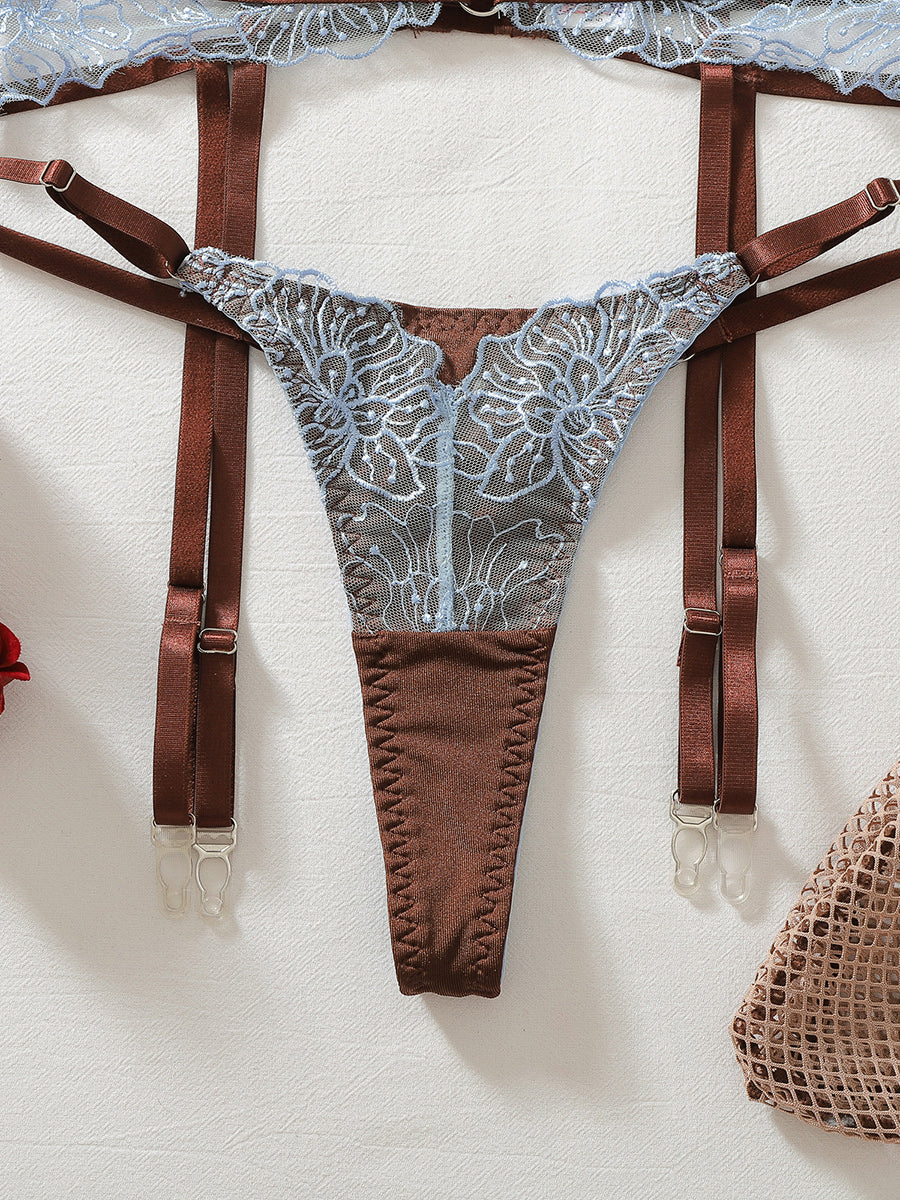 Floral-embroidered, sexy, form-fitting two-piece lingerie set with fishnet stockings.