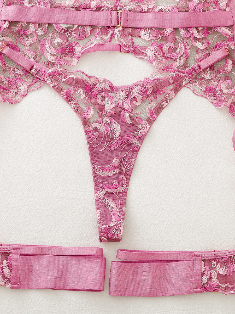 Sexy, elaborately embroidered floral bustier and leg garter set