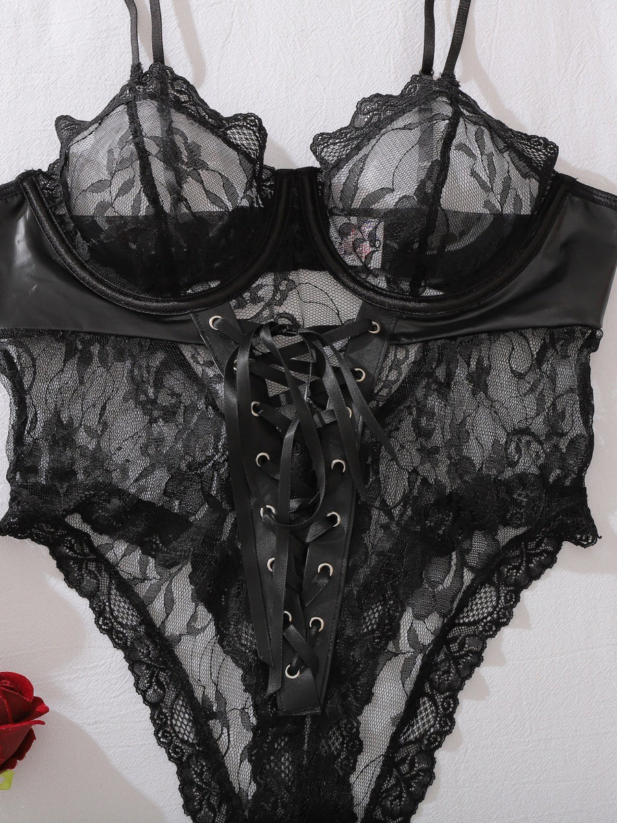 Sexy patent leather and lace bodysuit with a choker.