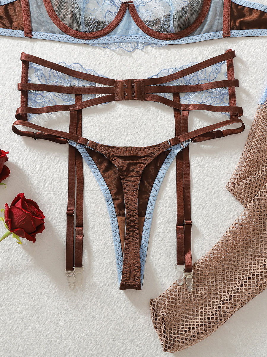 Floral-embroidered, sexy, form-fitting two-piece lingerie set with fishnet stockings.