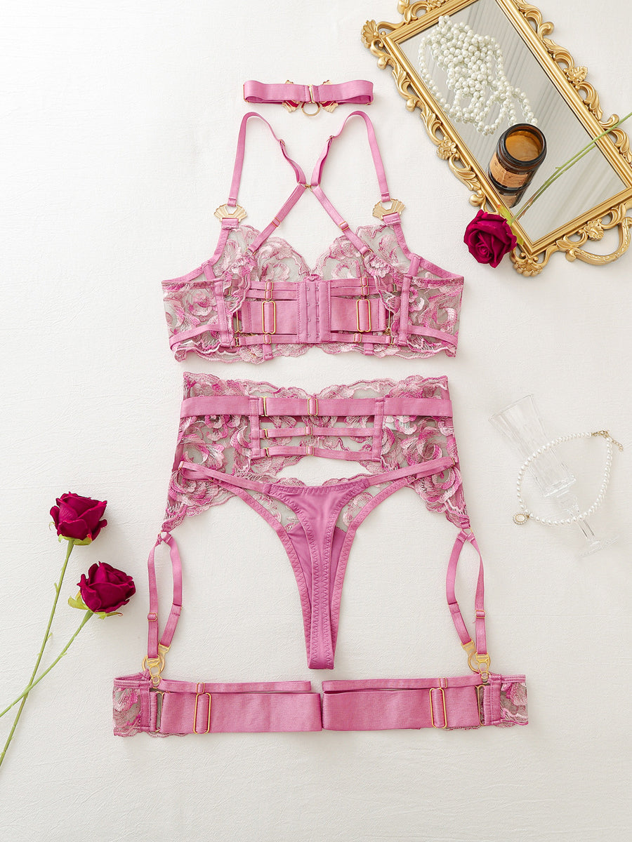 Sexy, elaborately embroidered floral bustier and leg garter set