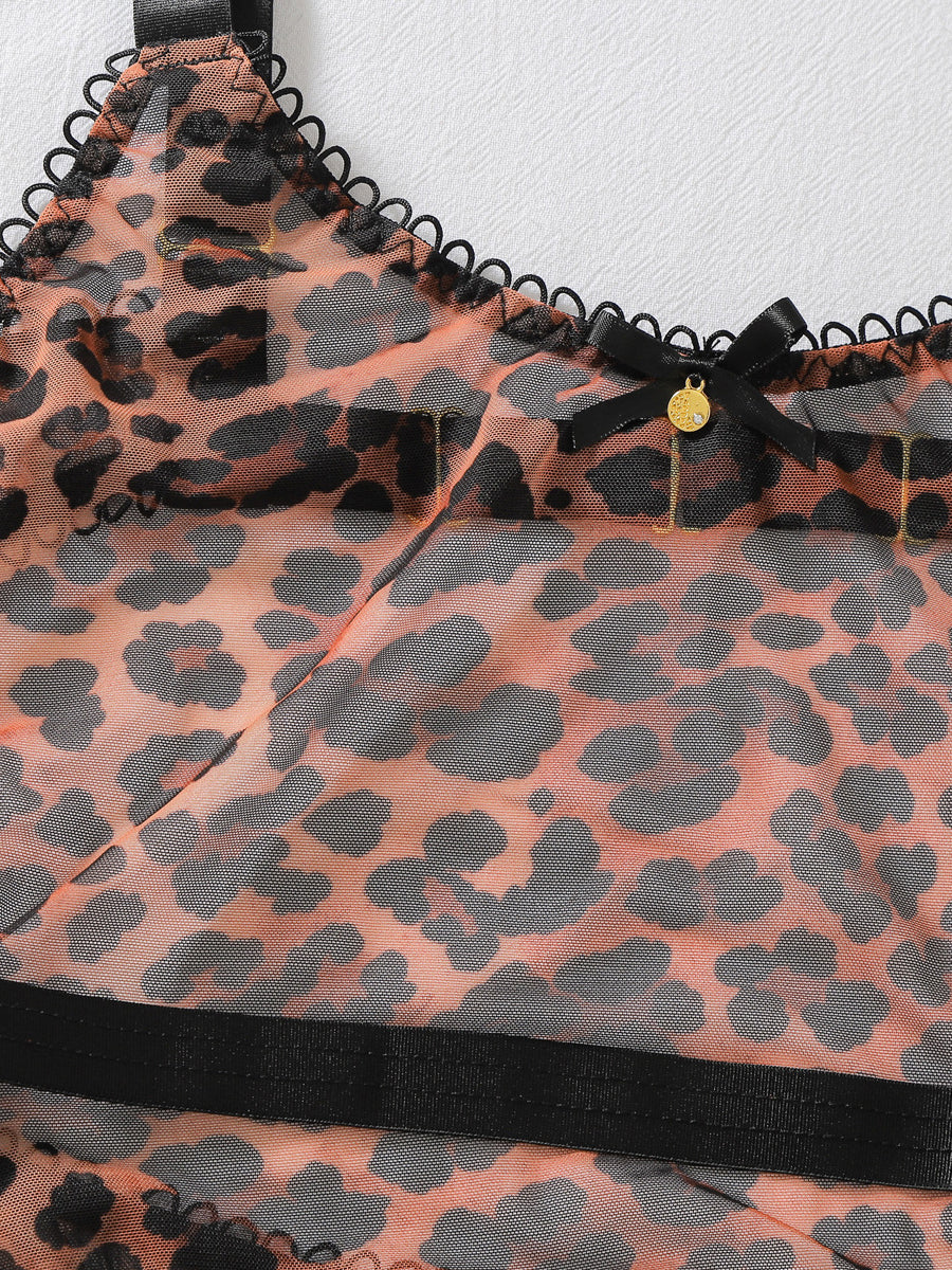 Sexy sheer leopard-print bodysuit featuring a bow, open-crotch design, gloves, and thigh-high stockings.