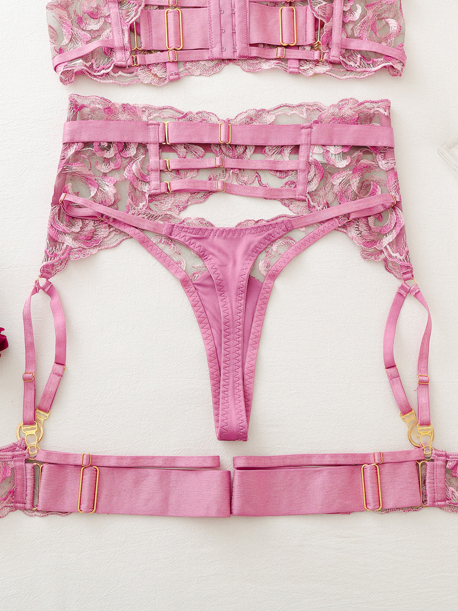 Sexy, elaborately embroidered floral bustier and leg garter set