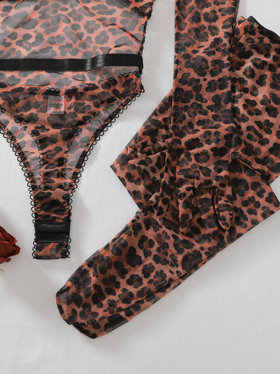 Sexy sheer leopard-print bodysuit featuring a bow, open-crotch design, gloves, and thigh-high stockings.