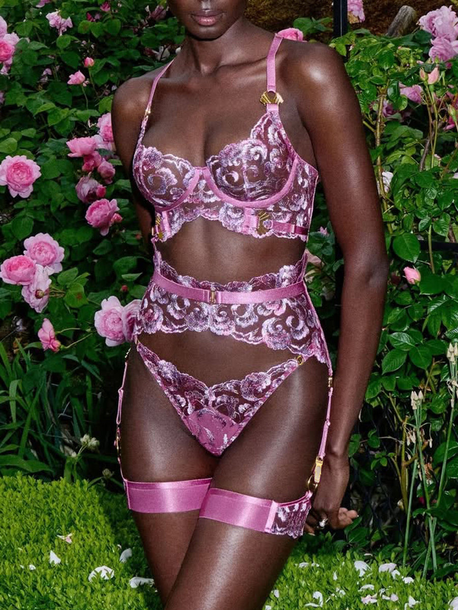 Sexy, elaborately embroidered floral bustier and leg garter set